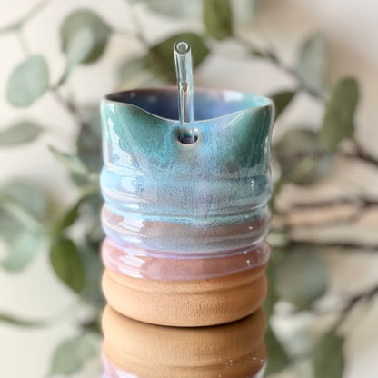 front view of lavender sky coffee tumbler